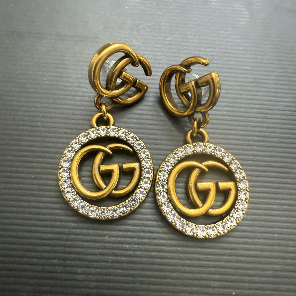 Brand new Gucci Gold tone Crystal Logo Drop Earrings - Picture 2 of 3